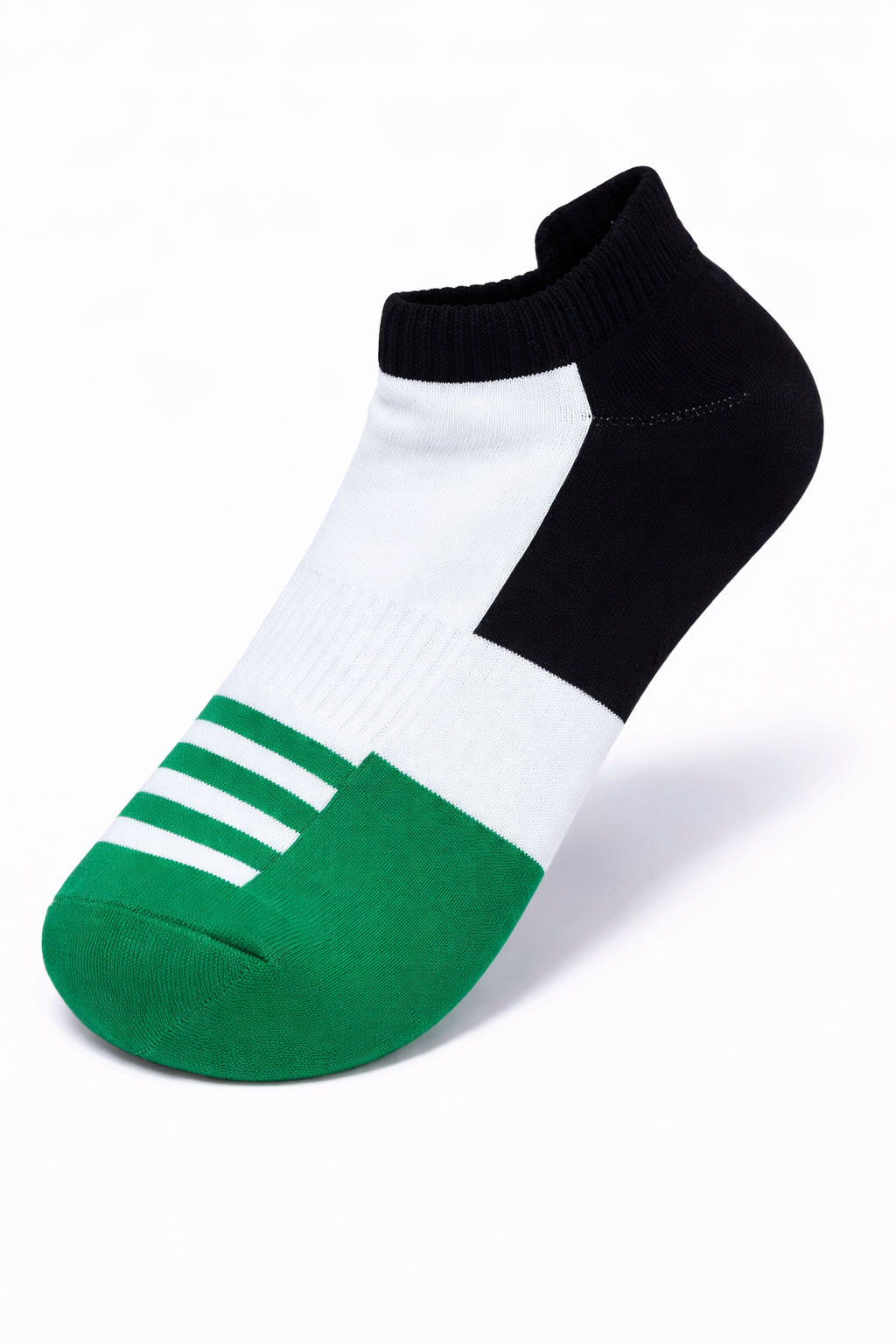Black, white, and green sock on a white background
