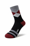 Black sock with red and gray diamond pattern on a white background